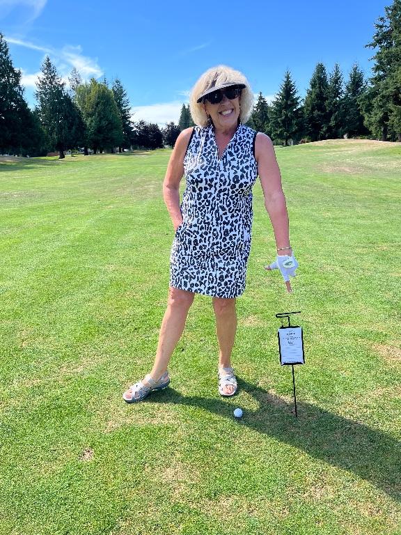 Carol Decoster wins "Longest Drive"