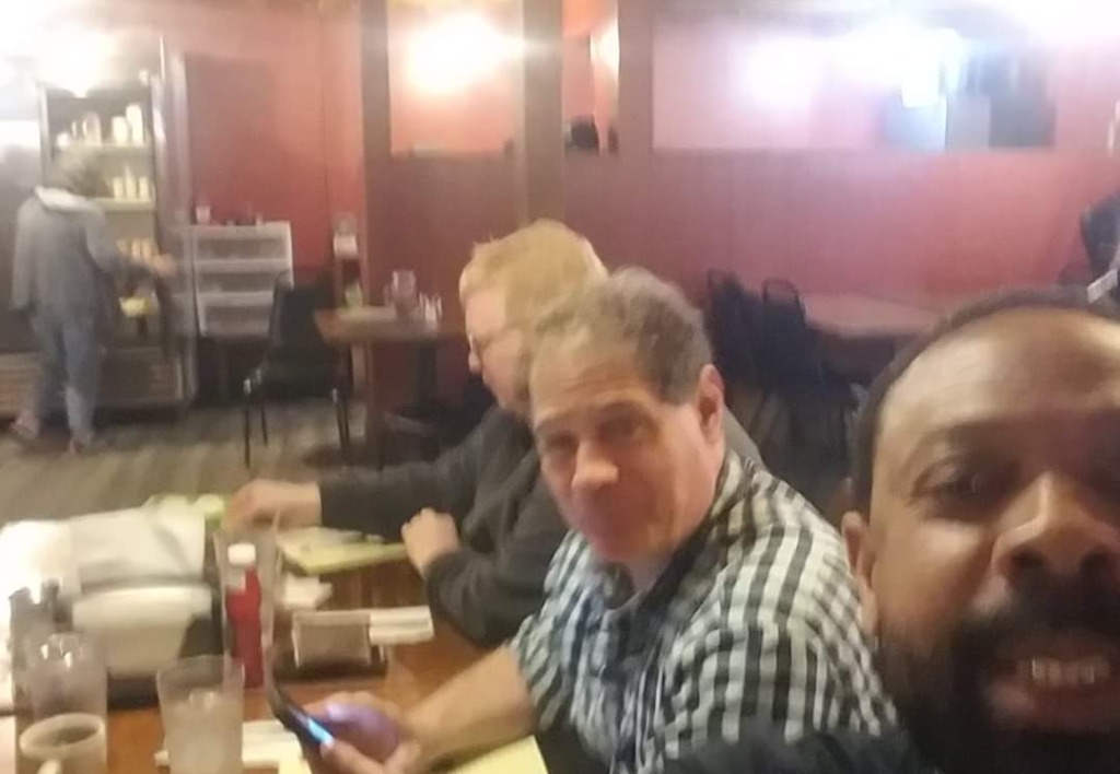 Kevin Seager, Rick Hatcher, and Tim Monroe ordering breakfast at P3 before their reunion committee meeting on March 14, 2020.