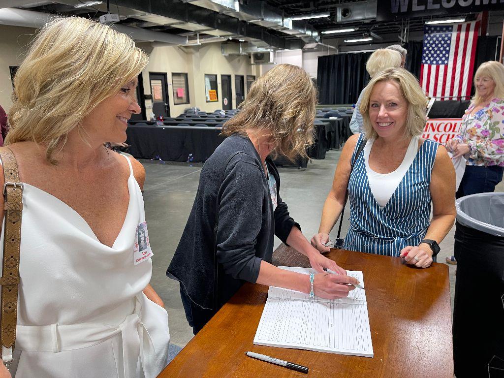 Lori (Denevan) Johnson, Elizabeth Rupp and Jeannie Collins on June 9, 2023, at the South Dakota Military Alliance.