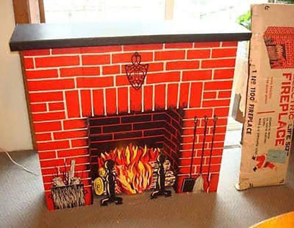 Who had a cardboard fireplace at home?