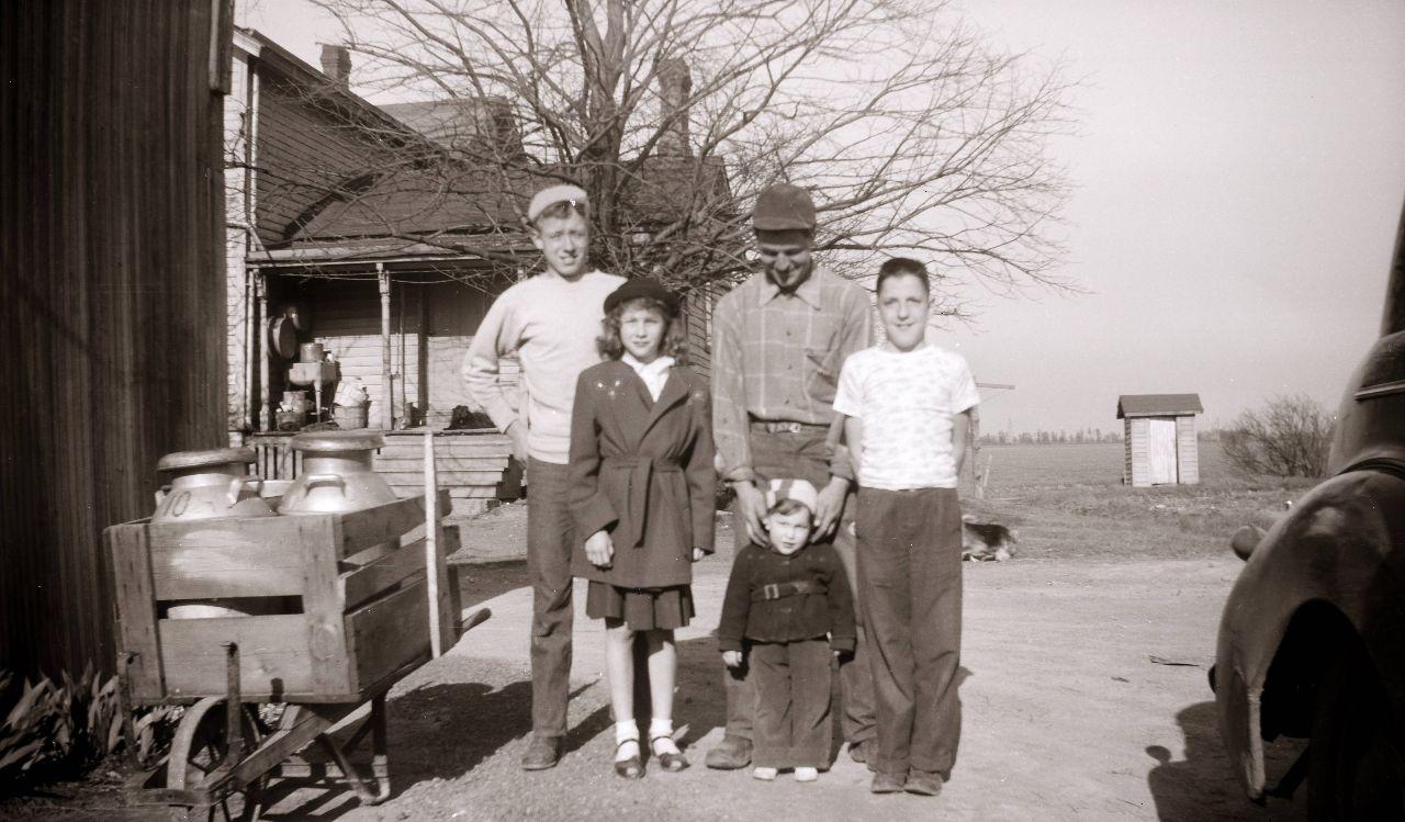 Don Dunn, Marcia, Uncle John, Albert Barnes?, Ron? See the outhouse in the back.