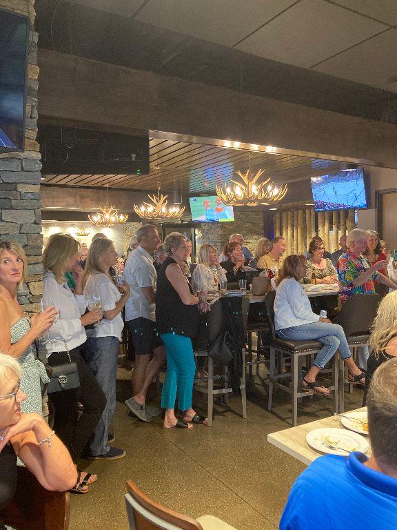 Classmates listen to speaker Mary Nell Wegner on Saturday, June 10, 2023, at the Blue Rock Bar and Grill.