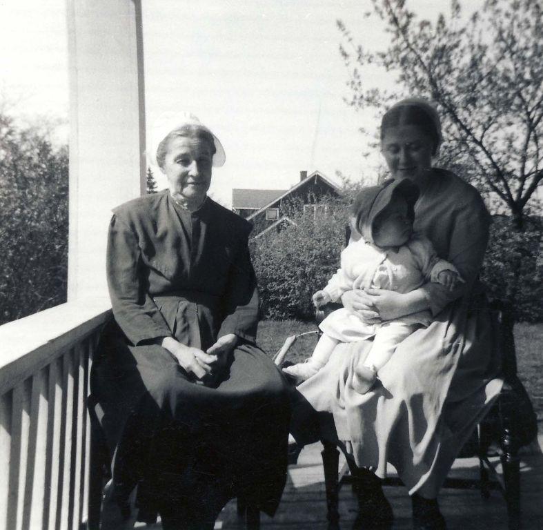 Grandma Rogers, Aunt Joan and Beth on the front porch at 118 South Union.