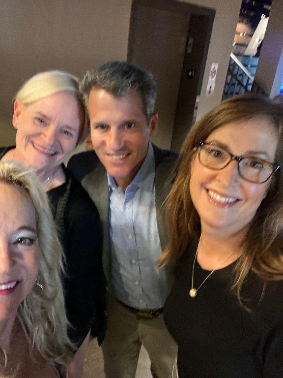 Cindy (Alvine) Zechmann snags a selfie with Jill Faris and her husband, and Missy (Muchow) Bergon on June 9, 2023, at the South Dakota Military Alliance.