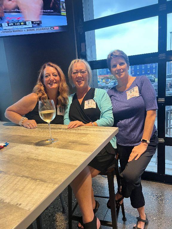 Sheila (Herr) Hoff, Susie (Polzien) Warwick and Nancy Voigt on June 10, 2023, at the Blue Rock Bar and Grill.