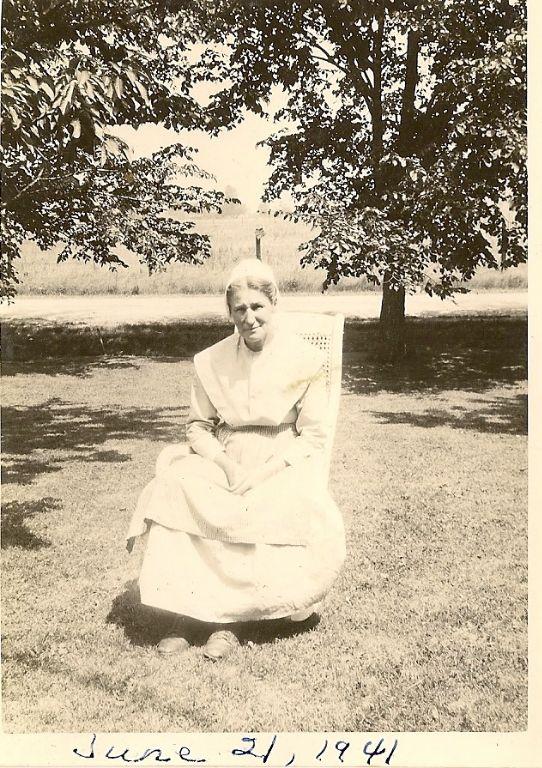 Grandma Rogers surrounded by her beloved cherry trees.