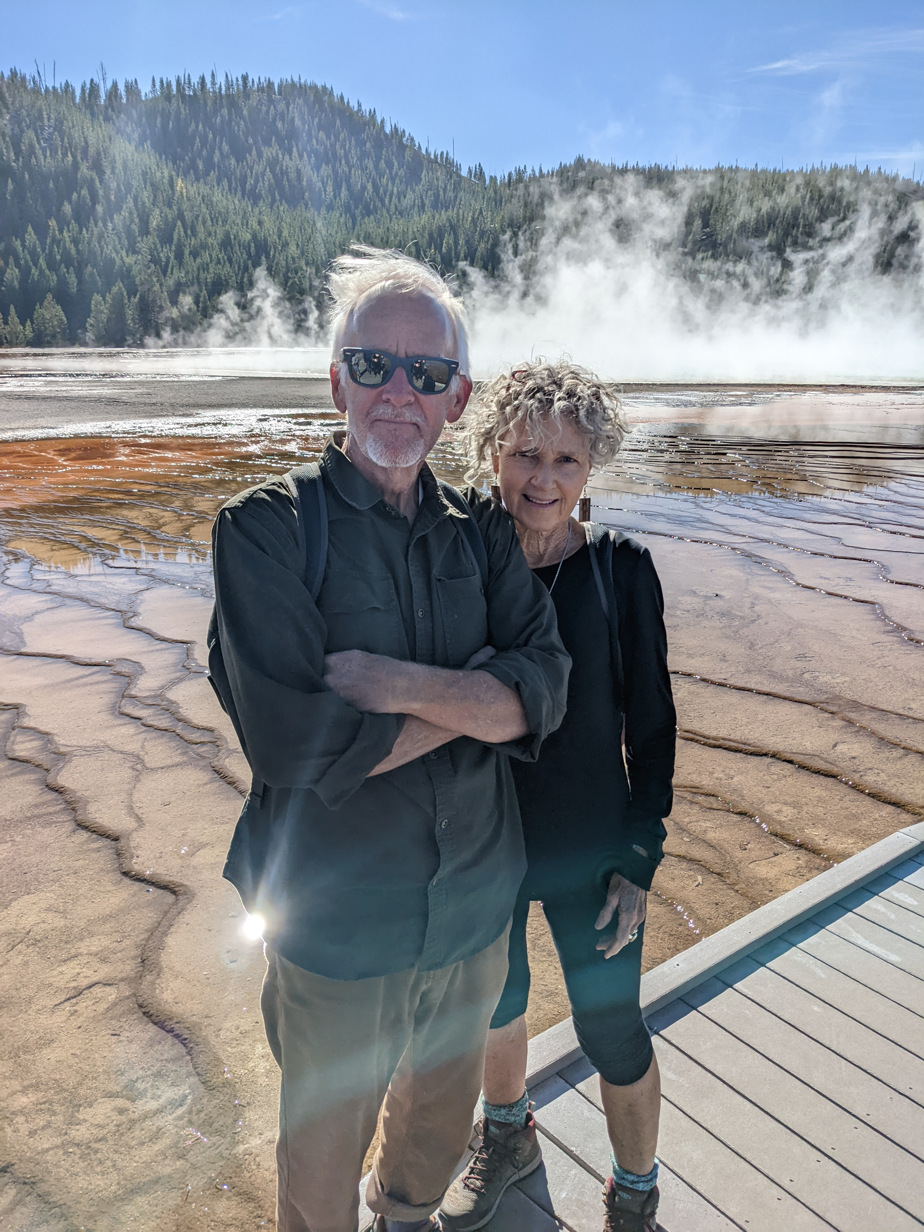 Laura and Pat biking through Yellowstone