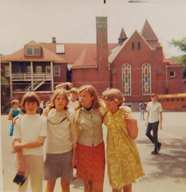 Whittier 6th Grade. Charlie Kleber flexing muscles in the background along with Ricky Knapp, Cheryl Trego, Sandra Kirk, Christine Lingwall and Martha ?