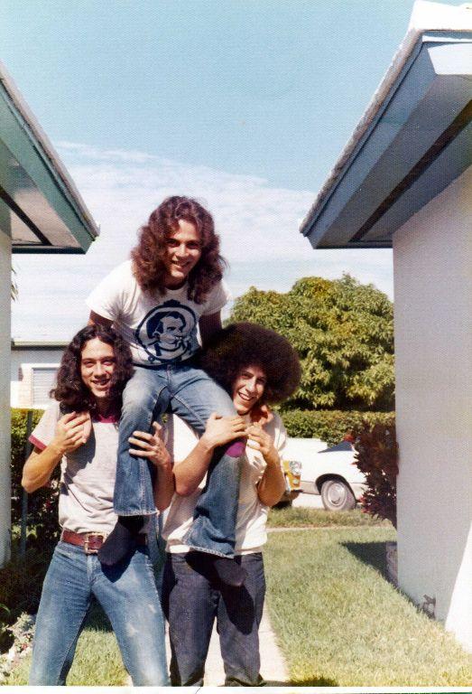 Glenn Cecero (class of '70), and Robert Kline (72, and may he rest in peace) carry Hank Eder, circa 1971. These were the "hippie" days.